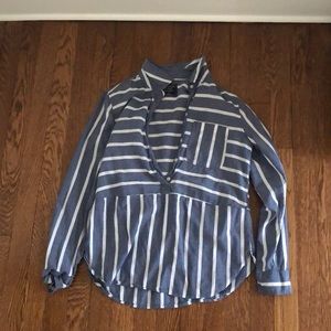 Striped button down shirt, flowy at the end